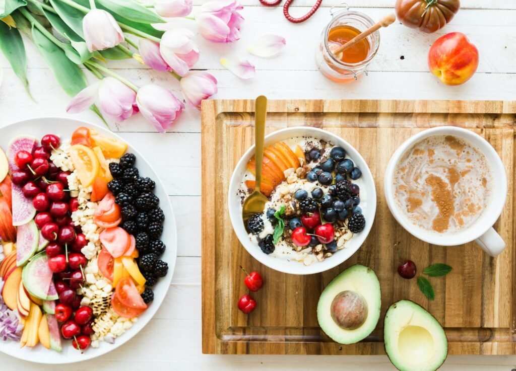 Fresh breakfast with fruit, granola and coffee